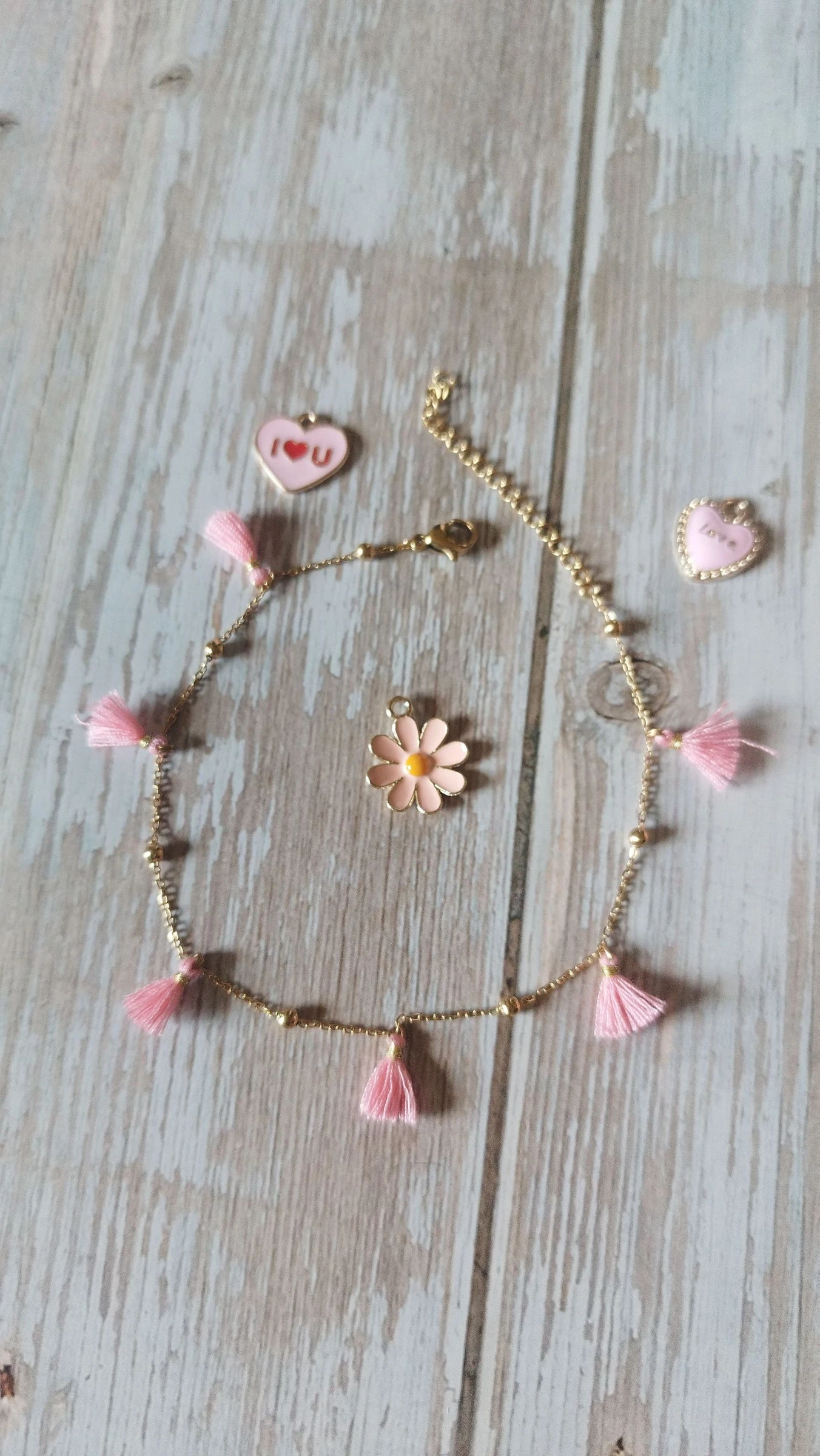 Bracelet de cheville doré et pompons rose en acier inoxydable 